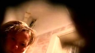 stepmom's toilet visit (spy cam)