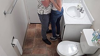 Skinny brunette gets fucked from behind in standing pose – toilet quickie