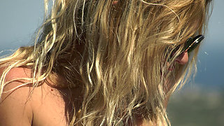 Busty Blonde Masturbating on the Pool