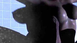 She rides a huge dildo in the shower