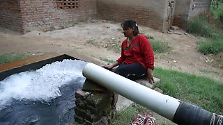 Desi Indian girl bathing in pool, village girl taking bath