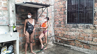They wet their mature and sexualized bodies in their neighborhood's shower.