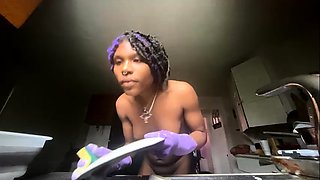 Fat amateur ebony chick plays with her tits and gets clean