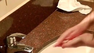 Student Taking A Piss on the Toilet