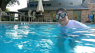 Couple Underwater Diving and Swimming