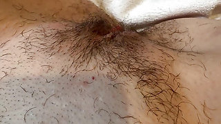 POV Girl shaves very hairy pussy close-up and rubs shaved pubic hair all over her body. Pussy in the mirror