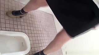 Asian Pisses In Toilet
