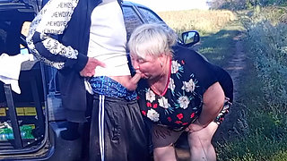 Stepmom holds my dick while I pee and then sucks it in public