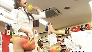 Japan employees play a game with balls and pantyhose