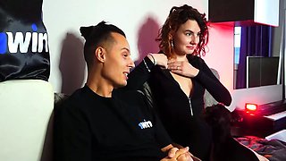 Darcy Dark plays undress games, flashing all-natural jugs
