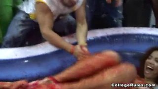 Watch these hot college girls engage in a naked wrestling match with a wet tshirt and fine ass!