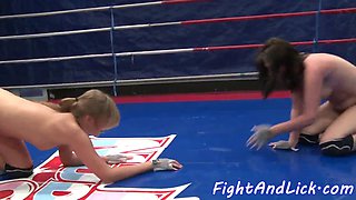 Lezzie and her lesbian friend go wild licking each other's trimmed pussies during a wrestling match