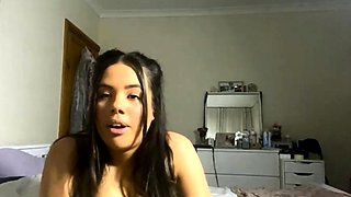 Busty curly brunette with big boobs fucks on couch