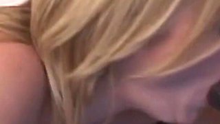 Sexy blonde gets surprised by big black cock while she masturbates with dildo