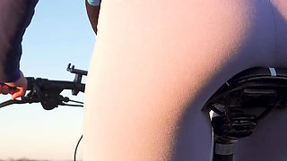 Teen Japanese Riding a Bicycle and Showing off Her Ass in Tight Leggings