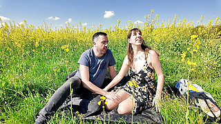Romantic doggy le in a field