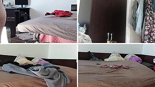 Sexy mom has fun trying on clothes and cutting them. Brunette hairy pussy, big tits.