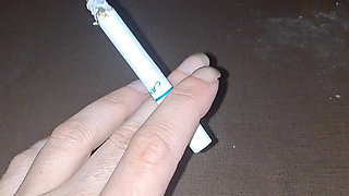 Long Fingernails & a Cigarette