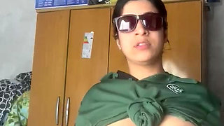 Selene enjoy in front of the camera and shows off her new glasses.