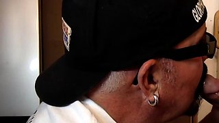 Old man caught cocksucking in gloryhole