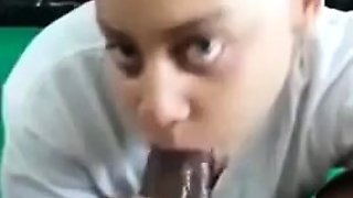 Small tit brunette gives blowjob to a big cock
