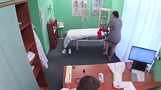 Doctor worships feet to brunette patient
