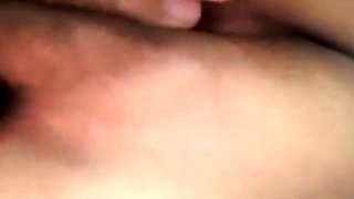 Thai granny 67 years old fingering her pussy