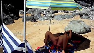A mature nudist masturbates filmed