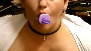 Spank the Nipples and the Big Saggy Tits, if There Wasn't That Vibro Plug in Her Mouth, That Would Be Really Intense.