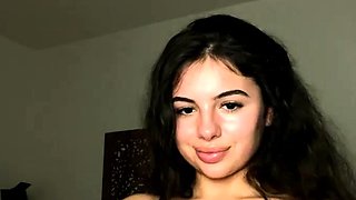 Big boob brunette masturbates on webcam