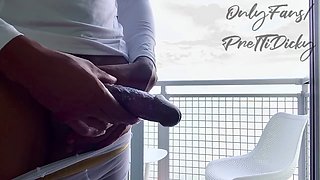 Ebony beauty gives a handjob to a big black cock and enjoys a jizz-filled orgasm