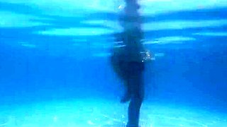 Busty milf goes skinny dipping and gets dicked down in a pool