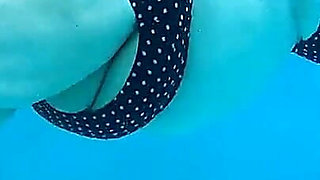 Couple Underwater Diving and Swimming