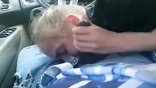 AMATEUR BLONDE SUCKING A BIG BLACK COCK IN A CAR