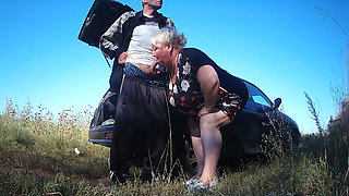my girlfriend holds my dick while I pee and then gives me a blowjob in public