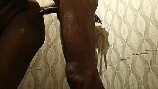 Indian village girl having sex with her husband while taking bath in bathroom diggy style
