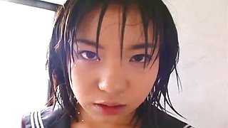 Young Japanese schoolgirl gives her first blowjob