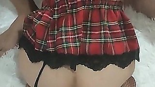 Schoolgirl in a Skirt Sucks a Small Dick