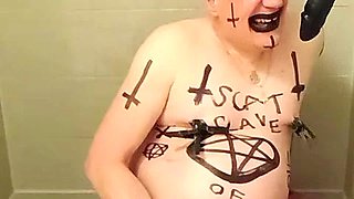 Satan slave takes an enema on Satan's orders