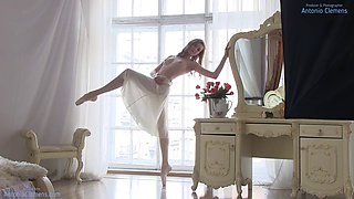 Stunning nude ballerina Annett A warms up for a shoot and strikes poses without a bra