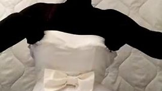 Black nylon doll with short white wedding dress