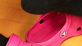 Under Desk Foot Play - Pink Clogs & Worn Socks