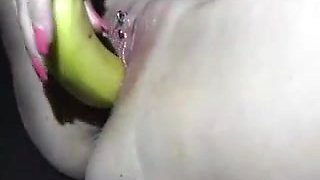 Pierced amateur wife with banana and fingers in her pussy