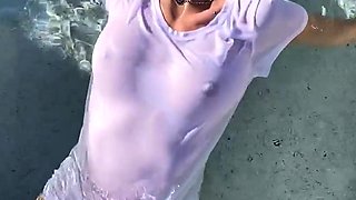 Busty curly brunette with big boobs fucks on couch