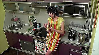 Petite short-haired housewife in high heels rubs her hairy cunt on the kitchen counter