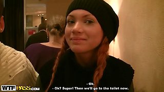 Redhead slut in public toilet fuck