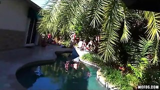 Wondrous latina turns a backyard pool party into a hot bath group sex