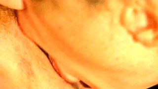 Mature blonde licks the pussy of a hairy woman
