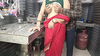 In the Kitchen, Stepbrother Fucks a Beautiful Stepsister in the Red Saree