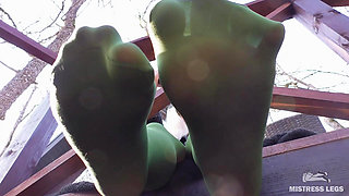 My nylon feet in green tights on your face